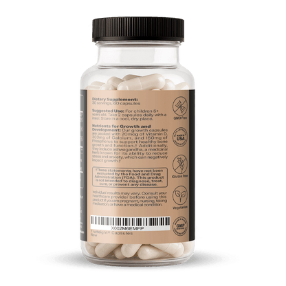 Product photo of TruHeight Capsules dietary supplement in a clear bottle with a black lid, showcasing a light brown label detailing 30 servings of 60 off-white capsules, "Made in USA", "GMO Free", and "Gluten Free" certifications, plus nutritional information for growth and development